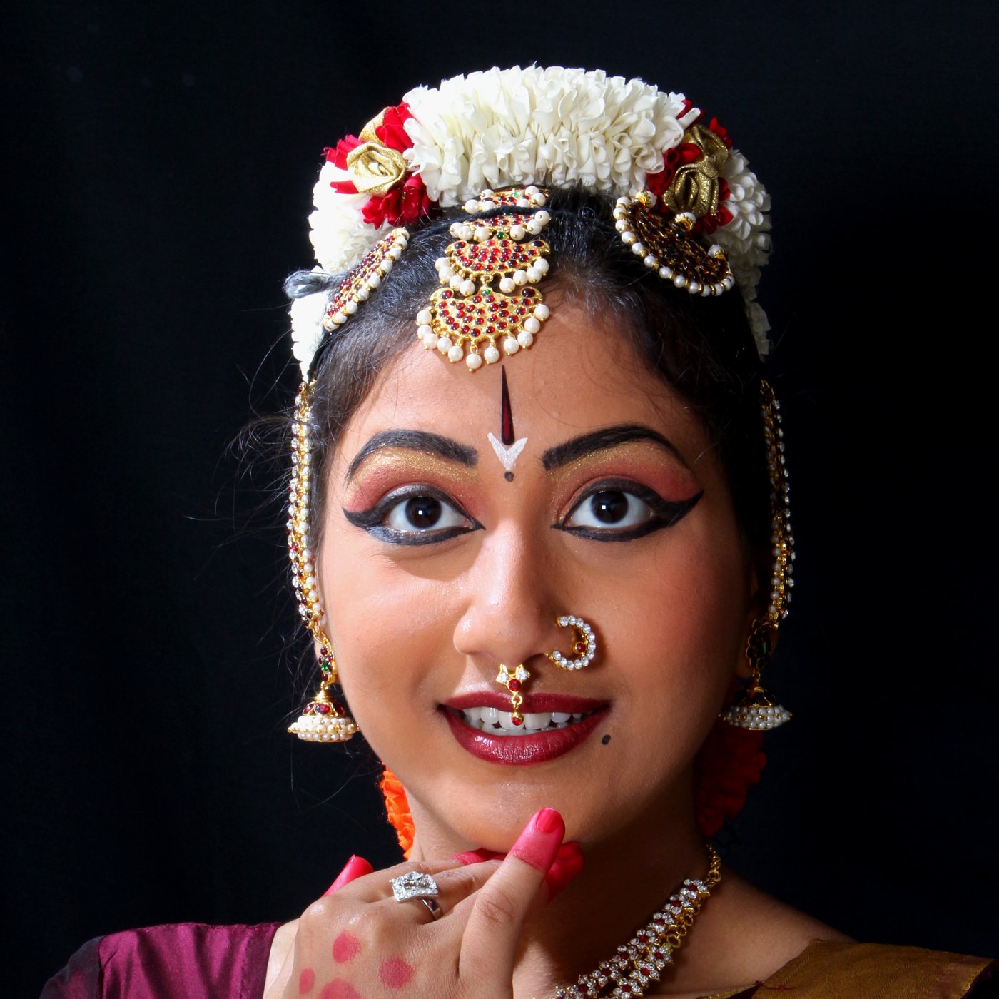 Square close portrait with kohl-lined eyes