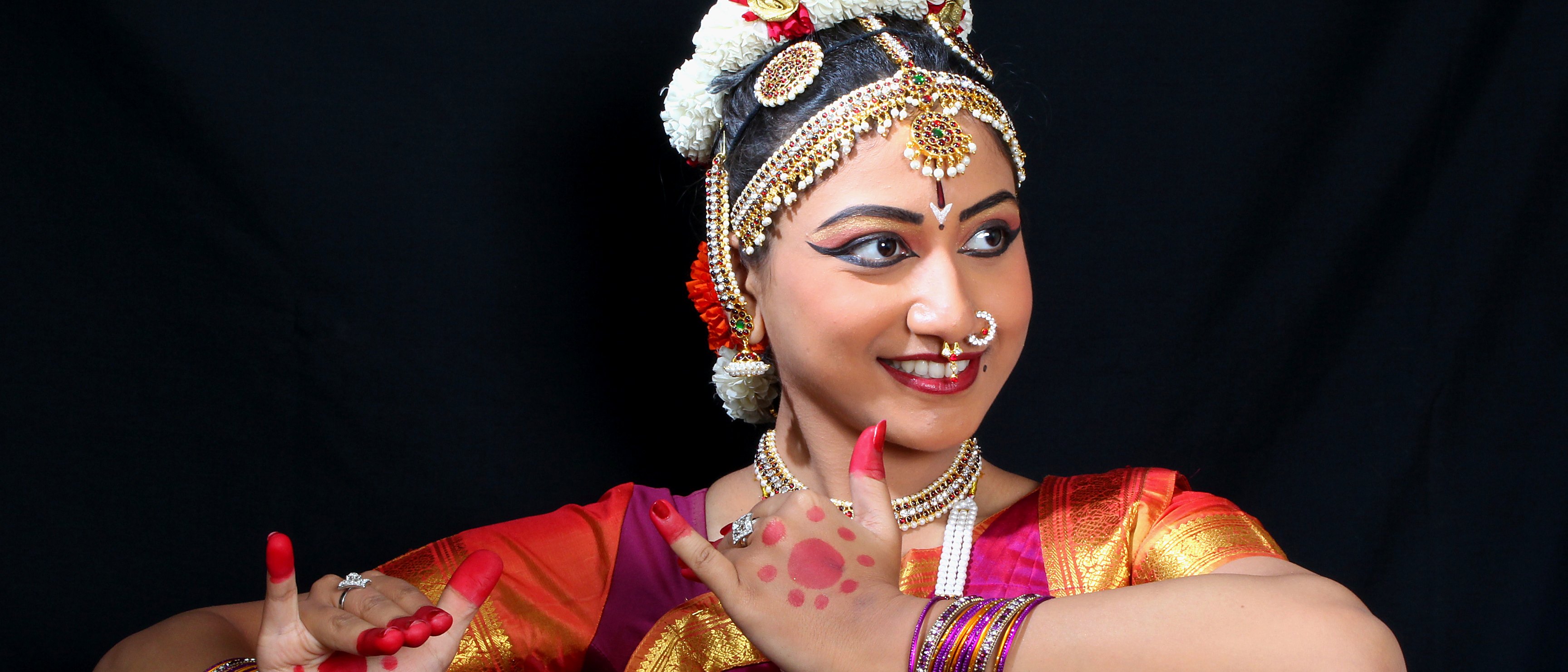 Cinematic crop of a smiling dance pose