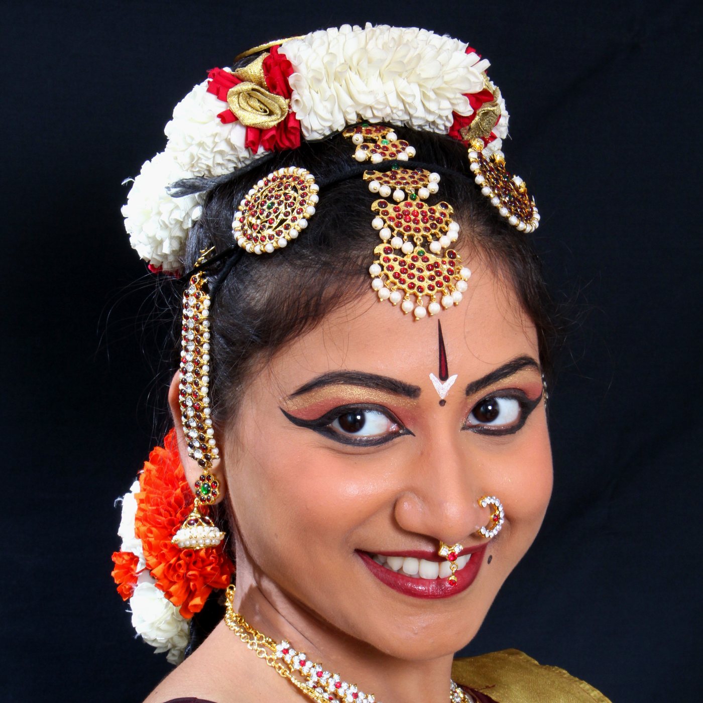 Square portrait with jasmine and temple jewellery